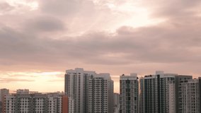 Aerial view of residential apartment buildings in Cyberjaya City at sunrise, Malaysia.