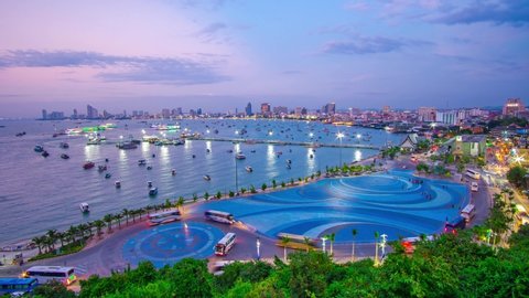 4k Time lapse Beautiful view during sunset with twilight and golden sky at pattaya city sign near Balihai bay. Famous place for tourist near Bangkok,Thailand. 