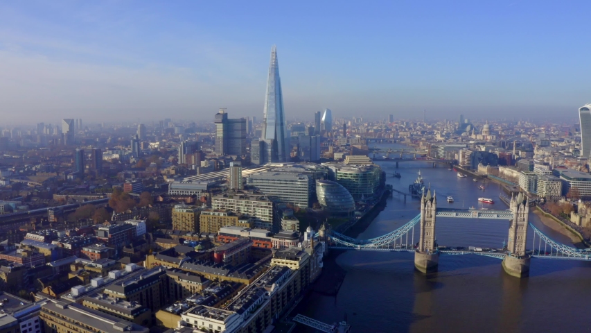 Flying over Tower Bridge in London, UK. The symbol of London. Royalty-Free Stock Footage #1042696927