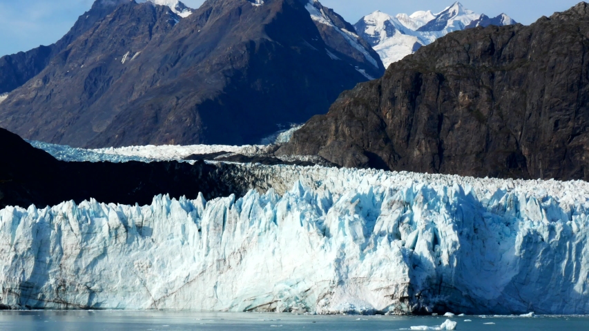 Landscape with snow-capped mountains with ice and water in Alaska image ...