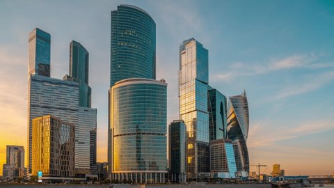 Day to Night HyperLapse of Moscow City Business Center Skyscrapers at Sunset in Summer. Russia
