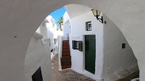 View of the alley of the fishing village of Binibeca Vell, Menorca, Spain.