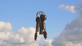 House keys. Estate concept, keys on against the blue sky - Powered by Shutterstock - Get 15% off with code: PIKWIZARD15