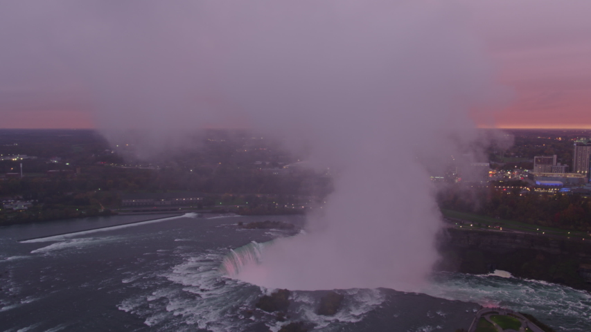 Niagara Falls Ontario Aerial  Ascending panning detail of Horseshoe Falls Park at sunset - October 2017