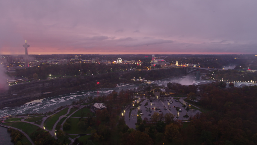 Niagara Falls Ontario Aerial  Wide scenic panoramic view of Horseshoe Falls Park cityscape at sunset - October 2017