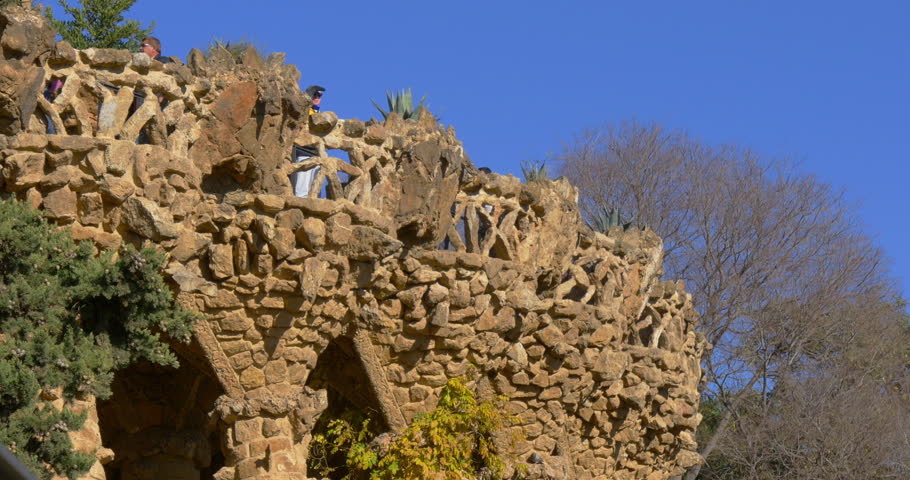 park guell sun light gaudi tourist balcony 4k spain
