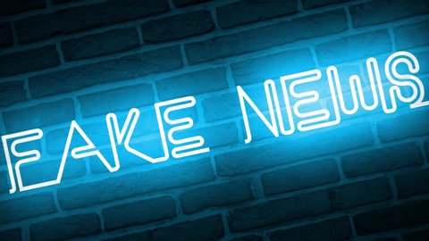 A video of a neon sign against a brick wall that reads:
Fake News