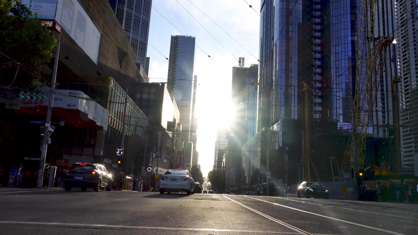 Traffic scence with car and people walking and buildings in urban city near Melbourne central in the afternoon. Melboure, Victoria, November 25 2019 | Shutterstock HD Video #1042751764