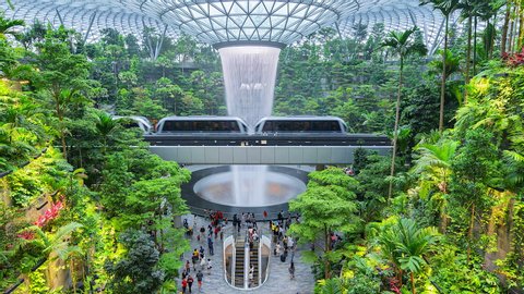Changi Airport - Singapore - July 14: Time lapse Waterfall at Shopping mall Jewel in Changi Airport connecting to Terminal 1 Arrival and Terminal 2,3 through linked bridges on July 14,2019 Singapore 