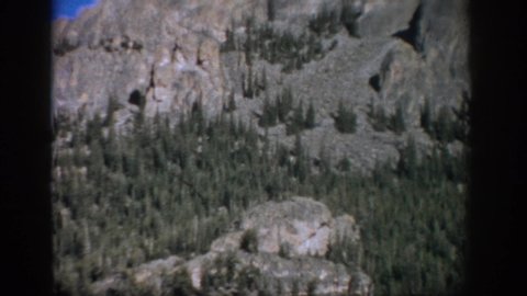 COLORADO USA-1959: Mountain Rising Above Lower Slopes With Trees In Foreground