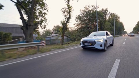 VINNITSA, UKRAINE - August 2019: Electric Audi e tron 55. Audi e tron first all electric SUV car on road