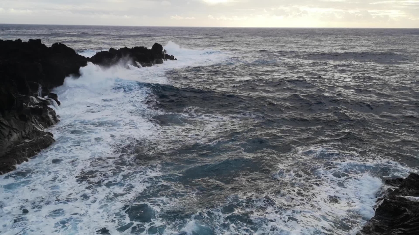 Easter Island Coastal Cliffs with Breaking Waves at Sunset