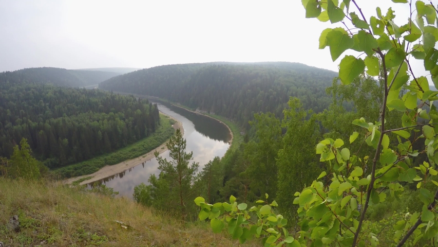 View of river form high view point. Classic view of Ural mountains and valleys.