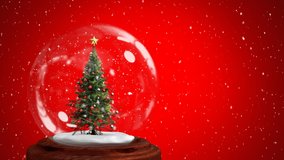 Animation of Christmas snow globe with Christmas tree inside and snow falling on red background - Powered by Shutterstock - Get 15% off with code: PIKWIZARD15