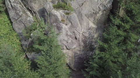 Stone rocks Ternoshorska Lada amidst beautiful scenic Carpathian forests, Ukraine