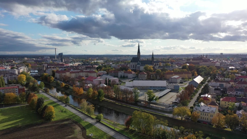 Aerial view of Olomouc cityscape overlooking Gothic spire of Saint Wenceslas Cathedral on sunny autumn day, Moravia, Czech Republic