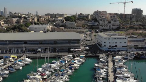 Port of Jaffa, Israel. Yachts in the port, Mediterranean Sea and coast. Harbor. Quadrocopter shooting. Old city aerial view. Aerial photography. Tel Aviv top view. Near East.