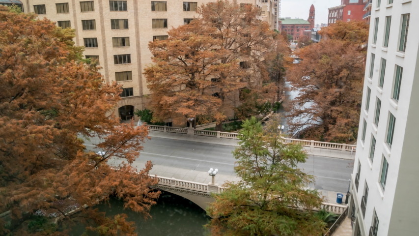 Aerial Day Time Time Lapse of San Antonio  Downtown River Walk River With Fall Season Color Trees