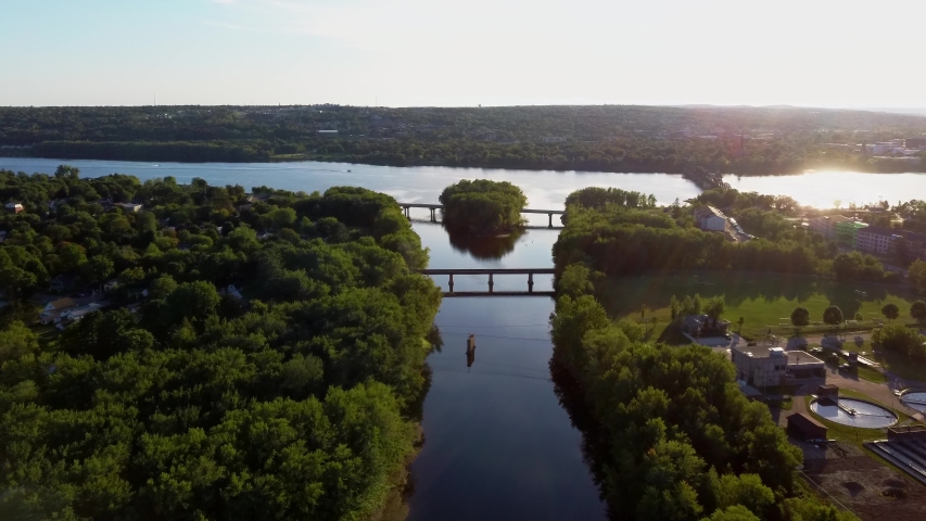 Flying toward the St. John River in Fredericton New Brunswick. 4K Drone footage Royalty-Free Stock Footage #1042842541