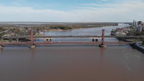 View from a drone of suspension bridge in Santa Fe city, Argentina. Video in 4K. Vehicles are passing while video are running.
