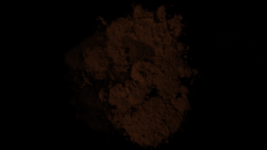 Super Slowmotion Shot of Orange Powder Explosion Isolated on Black Background at 1000fps. Royalty-Free Stock Footage #1042850359