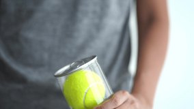 tennis ball on color background, pan shot for title or end credit clip