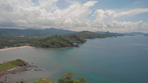 The green coast of El Nido from Nacpan Beach, drone shot in Palawan, Philippines