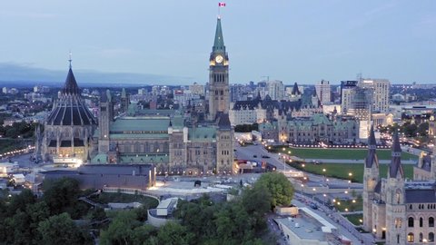 Aerial over Parliament Hill and the Ottawa city skyline at night. Ottawa, Ontario, Canada. 11 September 2019