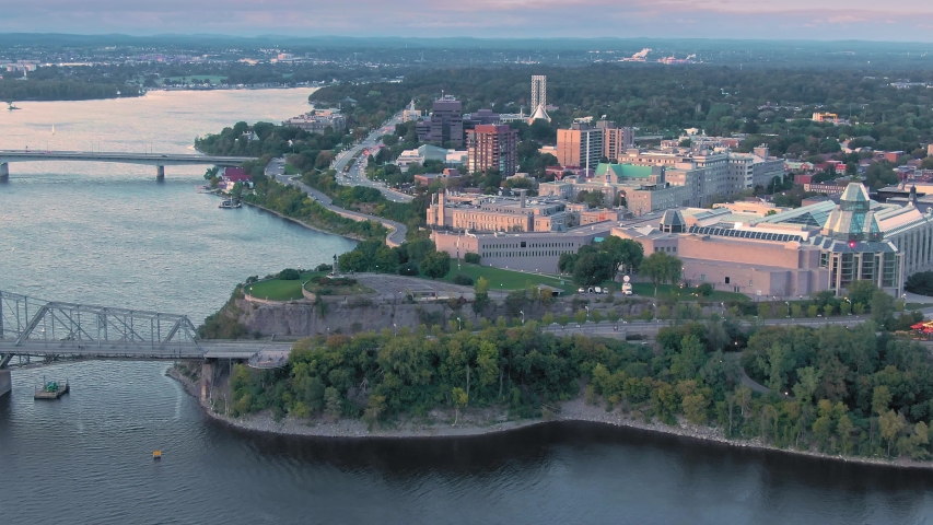 Aerial: The Ottawa River and city skyline. Ottawa, Ontario, Canada. 