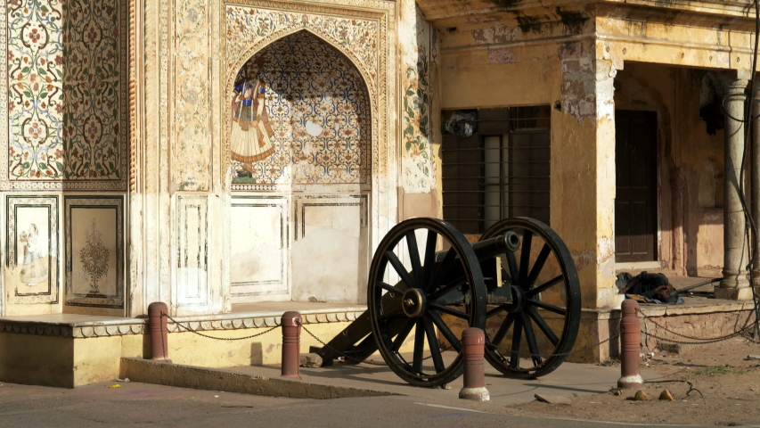 an old cannon outside an entrance to city palace in jaipur, india