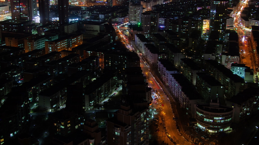 Tianjin night aerial cityscape panorama China timelapse pan up