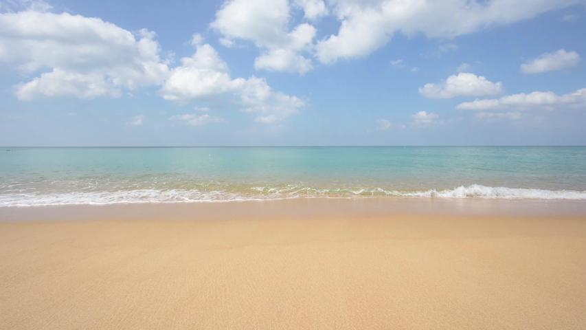 Phuket beach sea, View of beach sea on sun light in the summer. At Maikao Beach, Phuket, Thailand.  Freedom travel concept. 4K Prores UHD, Video Clip. Royalty-Free Stock Footage #1042909054