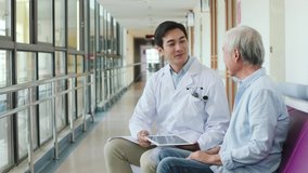 young asian doctor telling senior couple test result in hospital corridors - Powered by Shutterstock - Get 15% off with code: PIKWIZARD15