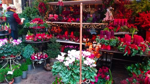 beautiful Christmas and New Year decorations, candles compositions, wreaths, toys and Christmas elements for sale on world's famous traditional Christmas market. 19 November,2019. Vienna, Austria.