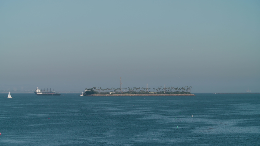 Tranquil view, huge Cargo ship anchored off Island Freeman, Long Beach, CA