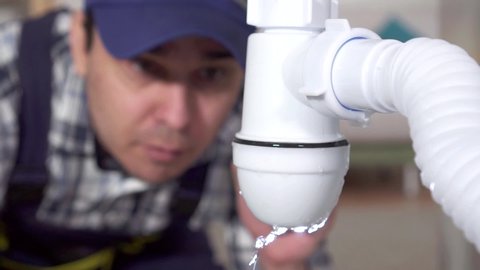 plumber discovered a water leak problem slow mo