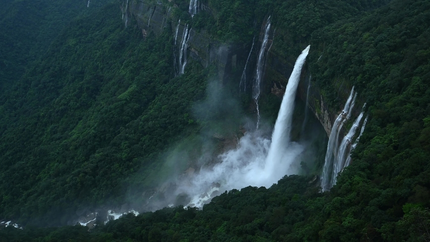 Famous Nohkalikai waterfall near Cherrapunji during peak Monsoon months,Meghalaya, India Royalty-Free Stock Footage #1042975315
