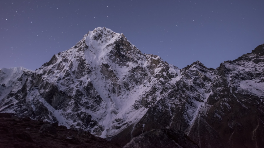 Starry sky over Cholatse peak