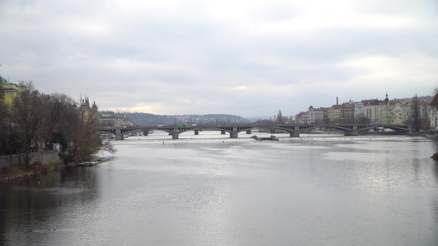 View of Prague from the bridge, Prague bridges on moldava with traffic