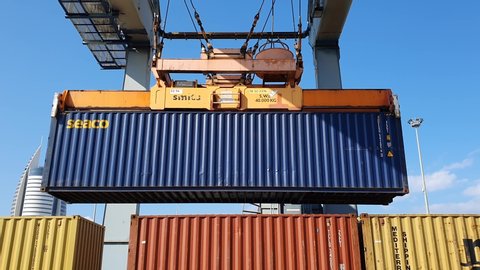 Haifa, Israel - 16.12.2019 : Unloading uploading Cargo Container at Port 4k intro outro for business