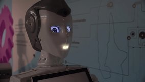 Artificial Intelligence. The robot shows emotions. Modern robotics. The machine looks and smiles at people. Eyes of the robot. Cyborg. Futuristic robot concept. artificial intelligence virtual robot - Powered by Shutterstock - Get 15% off with code: PIKWIZARD15