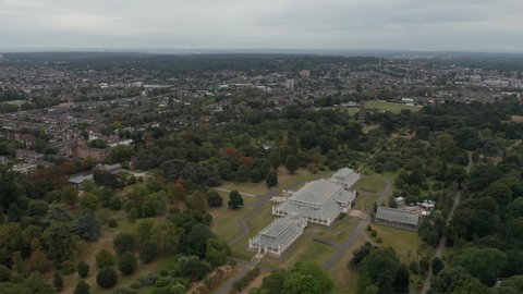 4k Aerial Shot Flying Away from Temperate House with Amazing View of the City