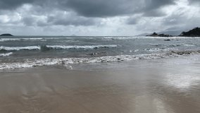 Landscape of the sea or ocean, strong waves on the beach. Cloudy sky in a tropical country, in Asia the rainy season in Vietnam