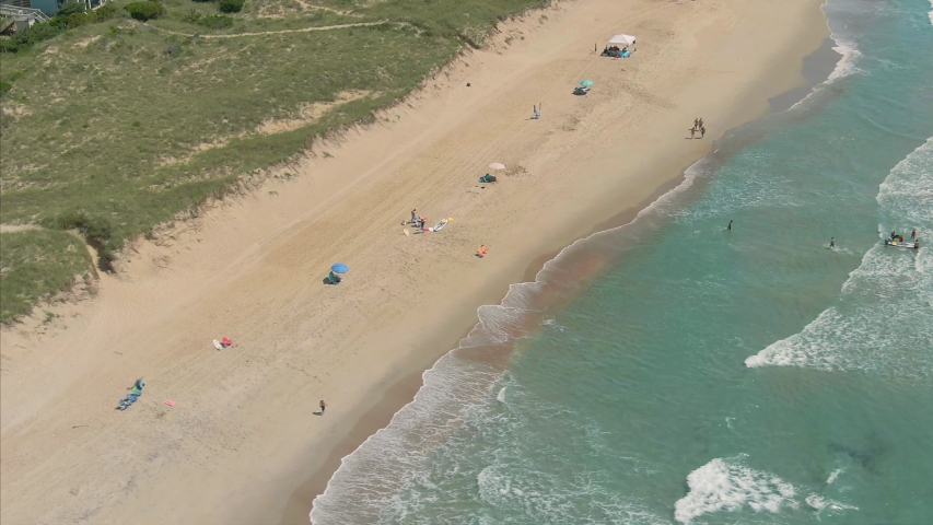 Aerial: Beach town of Hatteras in the Outer Banks, North Carolina, USA. 