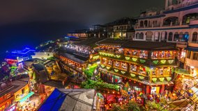 Time lapse of Jiufen in the evening with many tourists.