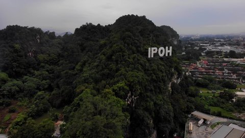Ipoh, Malaysia - December 2019. Aerial view of IPOH signage on top of a hill. Ipoh is a city in northwestern Malaysia