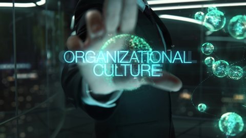 Businessman with Organizational Culture hologram concept