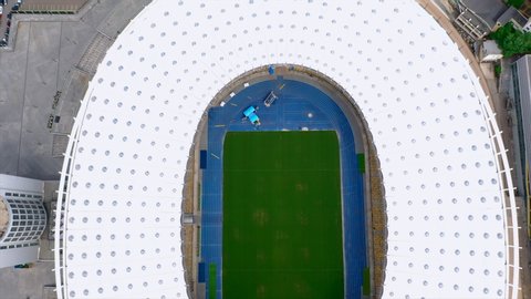 KIEV, UKRAINE - JULY 30, 2019: Aerial view of the Olympic Stadium and Kiev city.