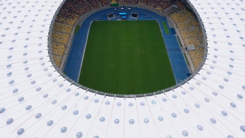 KIEV, UKRAINE - JULY 30, 2019: Aerial view of the Olympic Stadium and Kiev city.