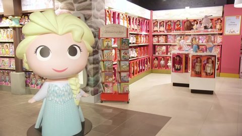 London, England - 13th December 2019: Toys and large Elsa figure from Disney's Frozen, in Hamleys Toy Store, wide shot.